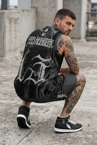 Blackness jersey and shorts crouching